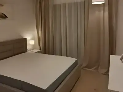 Dormitor apartament inchiriere Sector 2 Bucuresti cu pat